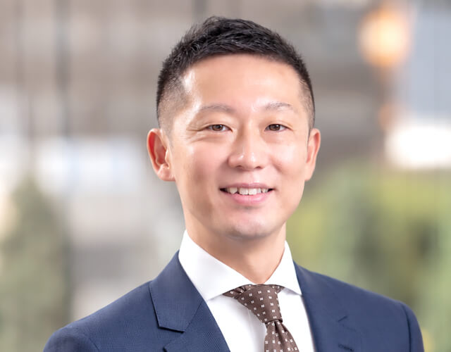 Executive Officer / Head of Corporate Management Division Ryuichiro Suda